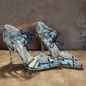 High heels shoes, snake skin , brand new , never use ,size 39